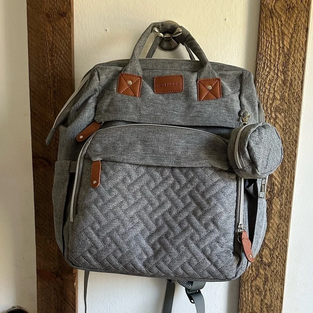 Boutique Large Diaper Bag, Backpack, Bassinet, Tech Charging Station all in one